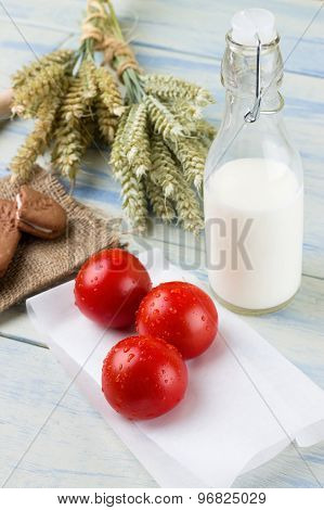 Three Red Tomatoes And Glass Of Milk