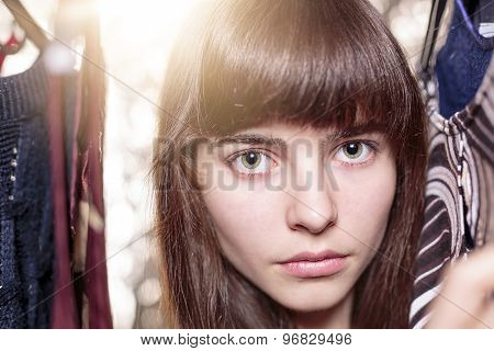 Portrait Of A Beautiful Teenage Girl And Her Wardrobe, With Bokeh