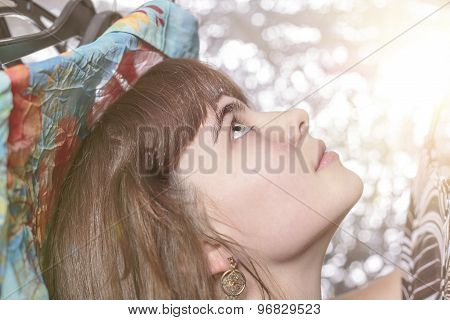 Portrait Of A Beautiful Teenage Girl And Her Wardrobe, With Bokeh