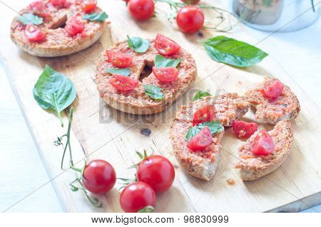 Friselle typical Italian bruschetta with corn tomato and basil