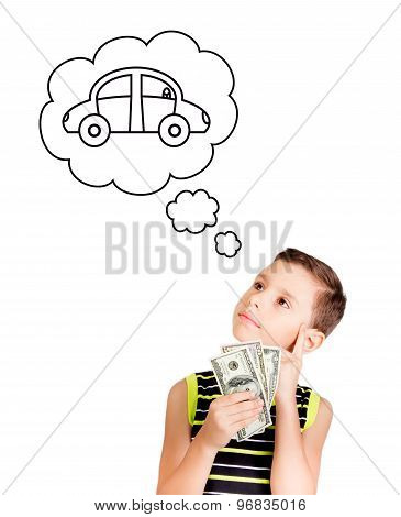 Young boy dreaming with a car to buy with his money