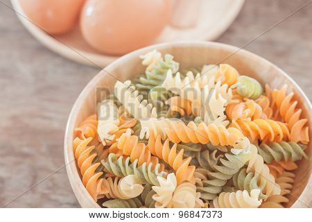Fusili Pasta In Wooden Plate With Eggs