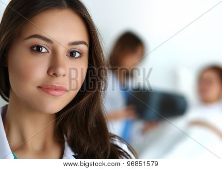 Beautiful Female Medicine Doctor Looking In Camera