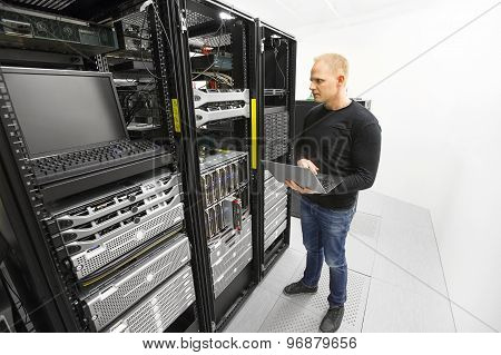 It engineer maintains servers in datacenter