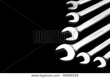 Six Fork Wrenches Isolated On Black Background