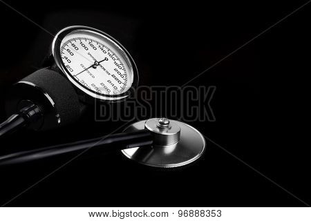 Manual Sphygmomanometer Isolated On Black Close-up