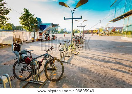 Parked Bicycles On Sidewalk Near Sanoma House in HELSINKI, FINLA