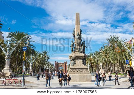 BARCELONA SPAIN - OCTOBER 22 2015: Tourists walking on Passeig de Lluis Companys promenade in Barcelona the capital city of the autonomous community of Catalonia in the Kingdom of Spain