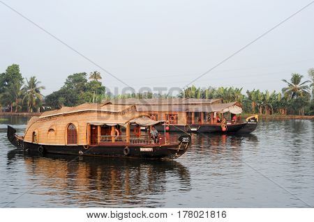 Traditional Indian Houseboat Cruising Near Alleppey On Kerala Backwaters