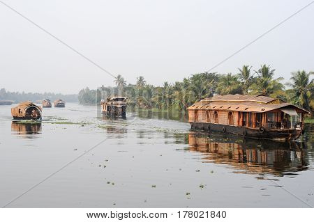 Traditional Indian Houseboat Cruising Near Alleppey On Kerala Backwaters