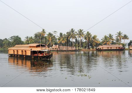 Traditional Indian Houseboat Cruising Near Alleppey On Kerala Backwaters