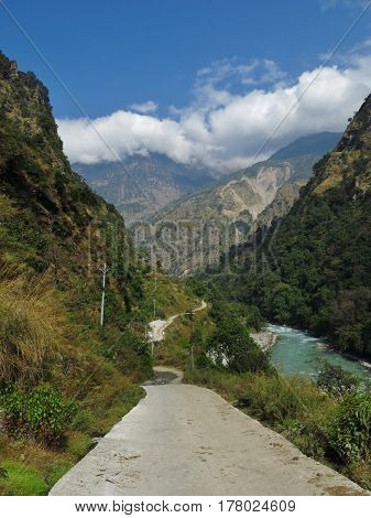 Road from Besi Sahar to Manang. Marsyangdi River. Autumn scene near Jagat Annapurna Conservation Area Nepal.