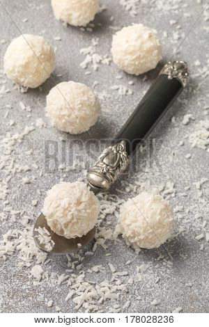 Homemade Coconut Candies In A White Plate On The Table. Sweets. Selective Focus