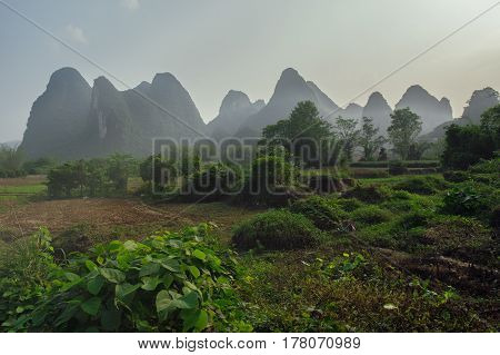Photo of the karts mountains and the fog sunset