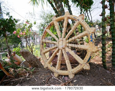 Buddhist rowel decorated on the garden of temple