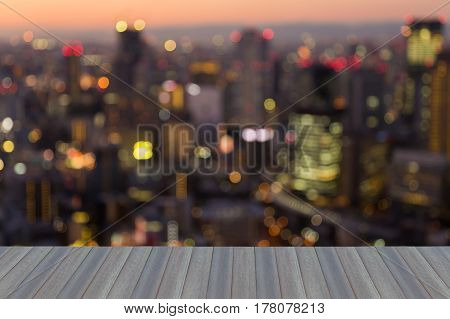 Opening wooden floor aerial view blurred bokeh light office building business downtonw abstract background