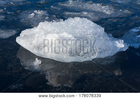 Natural lce cube on winter lagoon iceland natural landscape background