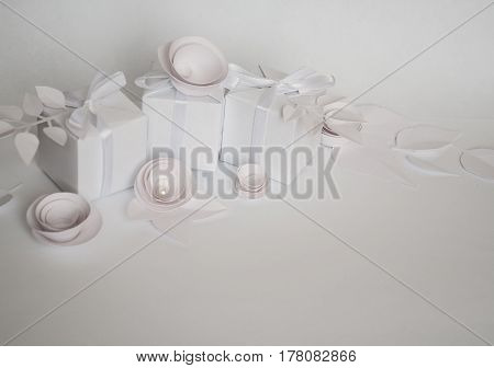 White Gifts And White Paper Flowers