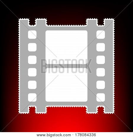 Reel of film sign. Postage stamp or old photo style on red-black gradient background.