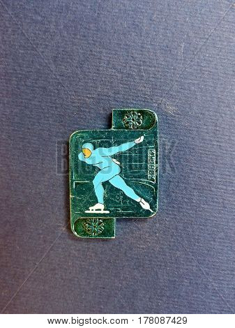 USSR - CIRCA 1980: Badge with a picture of skater and the inscription 