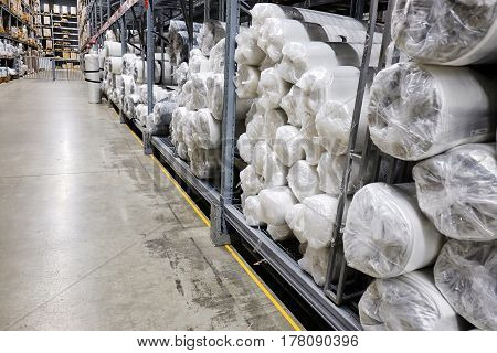 much plastic film is in stock in a modern shop