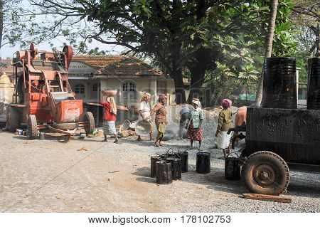 Woman Carrying Stones To Pave Roads At Fort Cochin