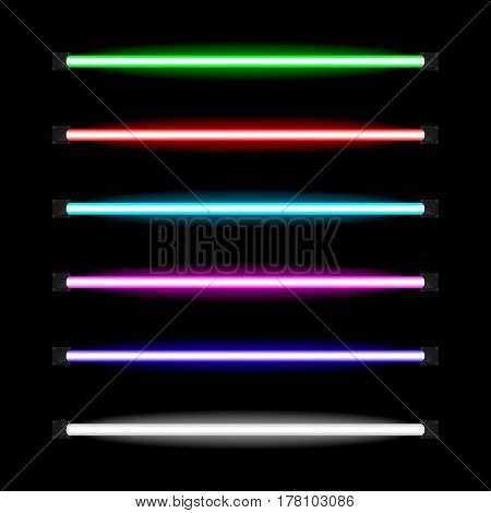 Neon lamps of different colors glowing in the darkness