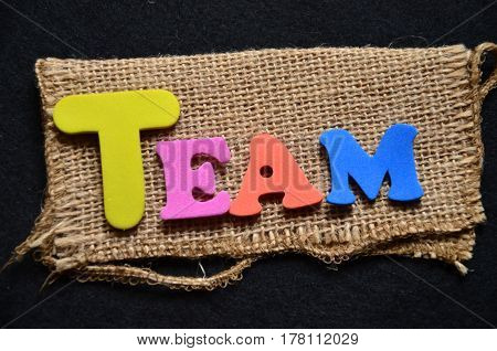 word team on a  aabstract colorful background