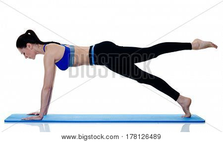 one caucasian woman exercising fitness pilates exercices isolated on white background
