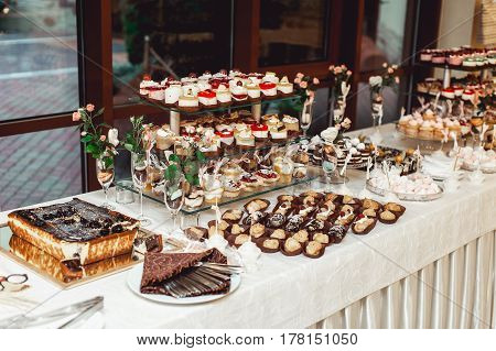 Eclairs, Traditional French Dessert. White Table