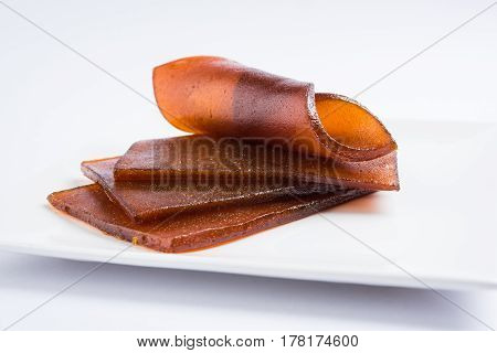 indian alphonso mango's dried jelly called mango papad or mango poli or slab or cake, traditional maharashtrian recipe