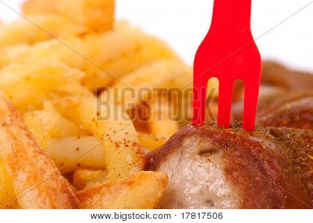 Kiełbasa curry i frytkami