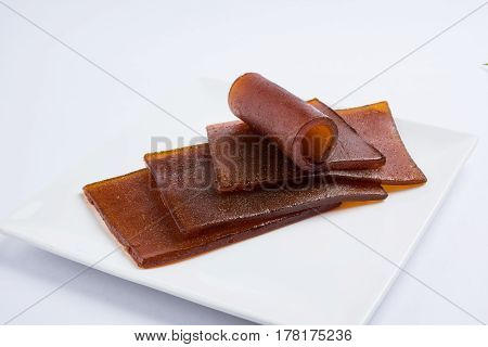 indian alphonso mango's dried jelly called mango papad or mango poli or slab or cake, traditional maharashtrian recipe
