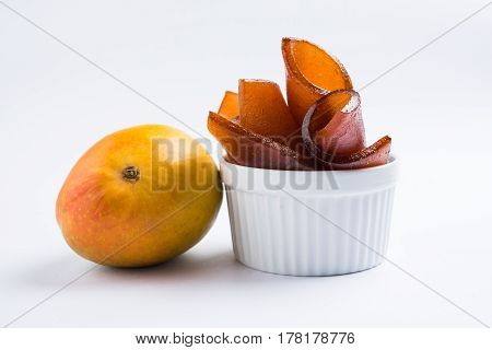 indian alphonso mango's dried jelly called mango papad or mango poli or slab or cake, traditional maharashtrian recipe