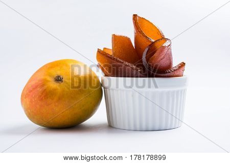 indian alphonso mango's dried jelly called mango papad or mango poli or slab or cake, traditional maharashtrian recipe