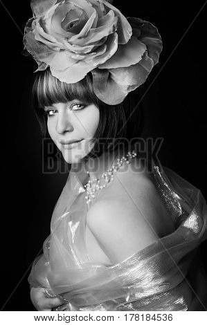 black and white portrait of a girl in a dark roses suit