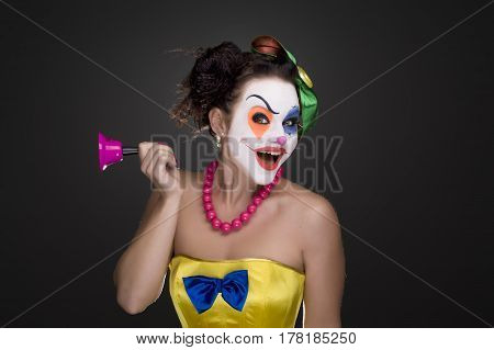 studio portrait of a young cute mime