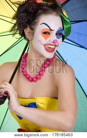 studio portrait of a young cute mime