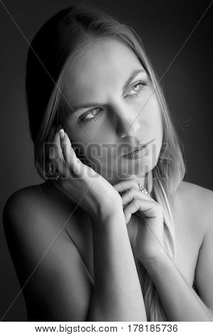 monochrome Portrait of beautiful woman on beige background