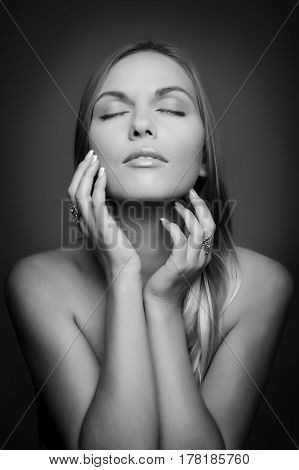 monochrome Portrait of beautiful woman on beige background
