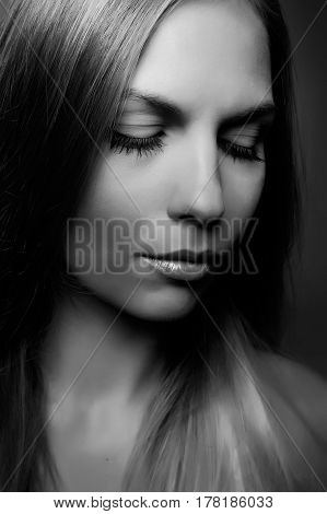 monochrome Portrait of beautiful woman on beige background