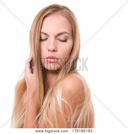 Close-up portrait of beautiful girl with closed eyes, isolated on white