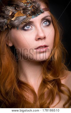 Closeup portrait of a redhead female model