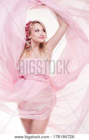 Photo portrait of a lovely young pregnant woman in a photo studio.