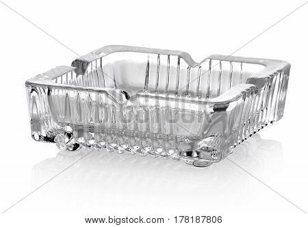 Beautiful glass ashtray isolated on a white background