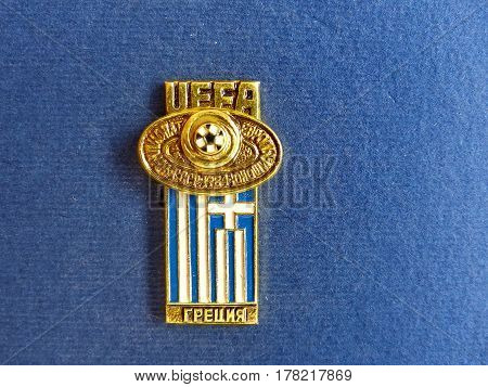 USSR - CIRCA 1984: Badge with the image ball and flag Greece, the inscription 