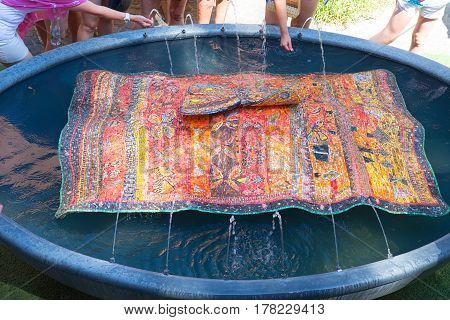 Fountain in Santarcangelo whis colored mosaics in Italy