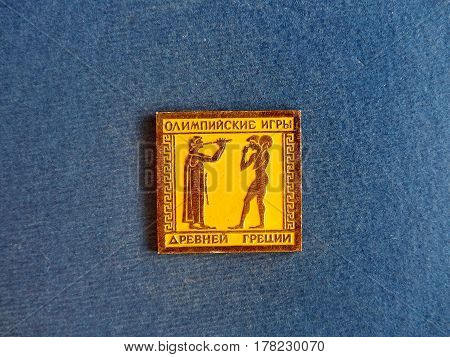 USSR - CIRCA 1980: Badge with the image of the an ancient sportsmanl and the inscription 