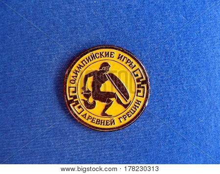 USSR - CIRCA 1980: Badge with the image of the an ancient sportsmanl and the inscription 