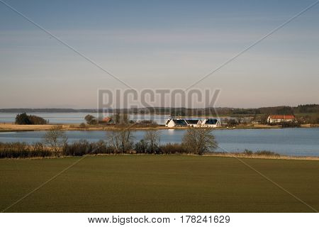 Danish springtime landscape. View from Fons church. Gamborg Fjord in the background.